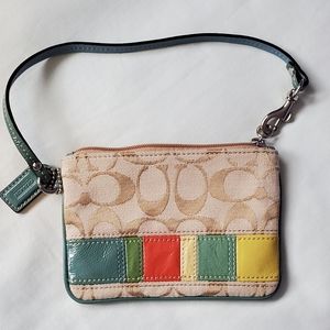 A Coach wristlet